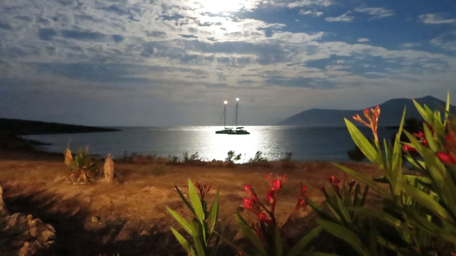 Catamaran Pluto - Nautitech 47 on anchor in the night