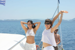 Yoga on deck of catamaran Pluto