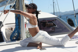 Yoga on deck of catamaran Pluto